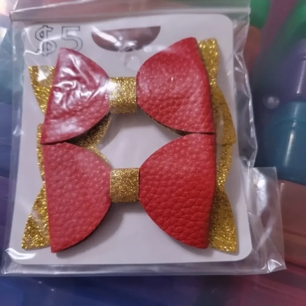 2 pack of Faux Leather red & gold girls‎ clip in hair bows